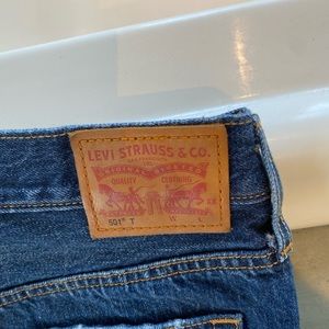 Levi’s button front distressed jeans